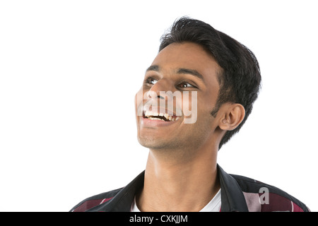Thoughtful Indian man. Isolated on white background. Stock Photo