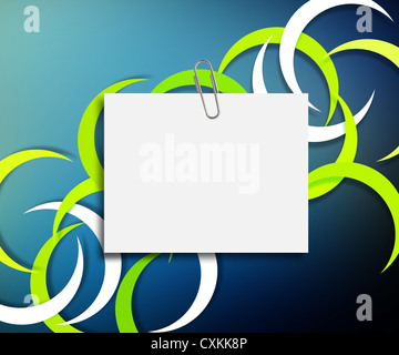 note paper with paper clip on colorful background. Stock Photo