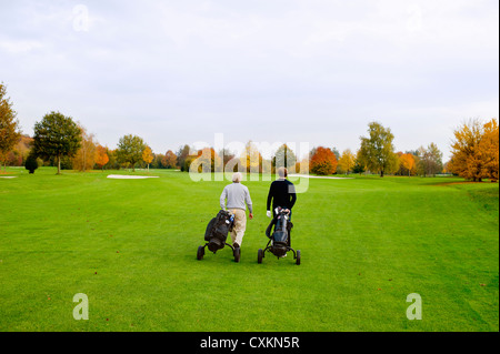 Men on Golf Course, North Rhine-Westphalia, Germany Stock Photo