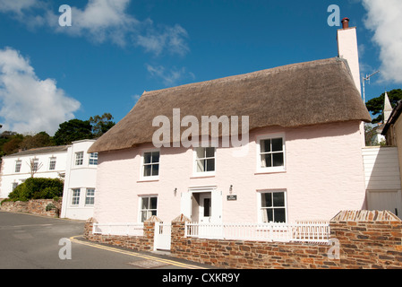 Pink thatched cottage in St Mawes Cornwall UK Stock Photo
