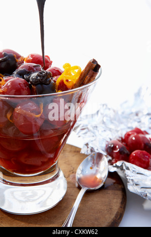 Maraschino Cherries with Drizzeled Chocolate Stock Photo