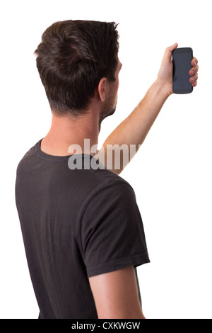 Young White Man In Black T-Shirt Working On His Smartphone Stock Photo