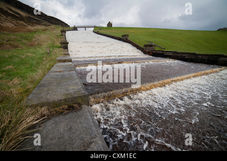 Overflow spillway at Butterley Reservoir, Marsden UK. A Grade II list structure replaced in concrete by the water company in 2016/17 Stock Photo