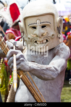 Mud man wearing a mud mask at the singsing Goroka Festival, Papua New Guinea Stock Photo