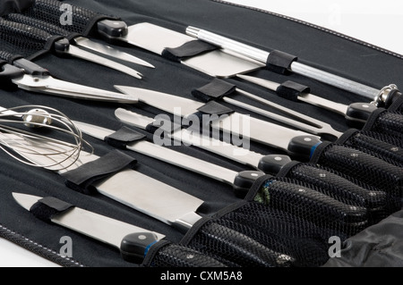 Professional chefs, cooks knife set in black case on white background Stock Photo
