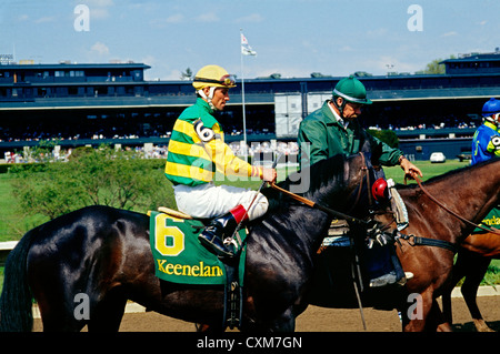 THOROUGHBRED HORSE AND JOCKEY WAITING FOR THE RACE TO START / KEENELAND RACE COURSE, LEXINGTON, KENTUCKY Stock Photo