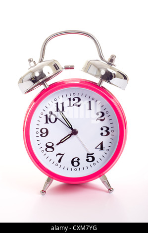 Pink alarm clock on a white background Stock Photo