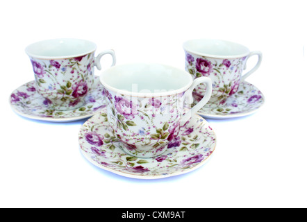 Cups with dishes isolated on white background. Stock Photo
