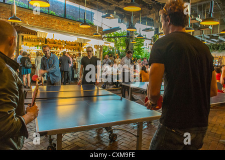 New York City, NY, USA, People in the Beer Garden, near the High Line Garden, in the Meatpacking District, Playing Ping Pong, Table Tennis Stock Photo