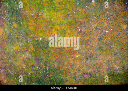 A colored texture of rusted plate of metal Stock Photo