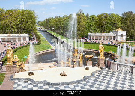 Central view of the main Cascade and Samson Fountain and the alley along the sea channel in Peterhof, Saint-Petersburg, Russia Stock Photo