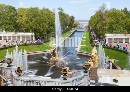 Central view of the Samson Fountain and the alley along the sea channel in Peterhof, Saint-Petersburg, Russia Stock Photo