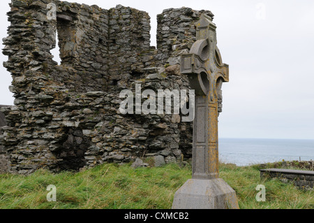 Ruins of St Marys Abbey Tower  and Celtic Cross Bardsey island Ynys Enlli Llyn Peninsula Gwynedd Wales Cymru UK GB