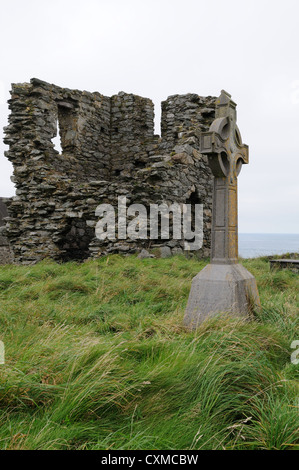 Ruins of St Marys Abbey Tower  and Celtic Cross Bardsey island Ynys Enlli Llyn Peninsula Gwynedd Wales Cymru UK GB Stock Photo