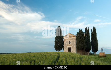 Cappella di Vitaleta in Tuscany, small chapel and cypress trees near Pienza Stock Photo