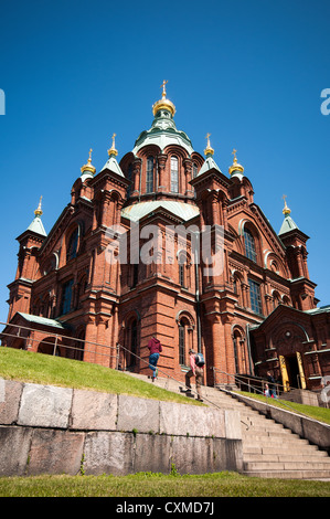 Uspenski Cathedral set upon a hillside on the Katajanokka peninsula overlooking the city of Helsinki, Finland Stock Photo