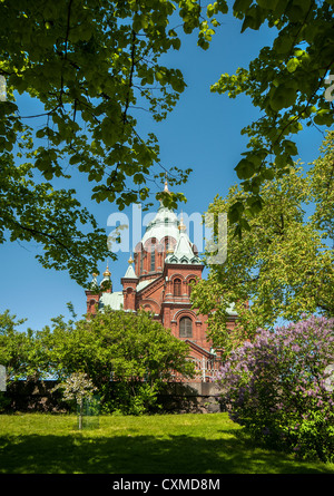 Uspenski Cathedral set upon a hillside on the Katajanokka peninsula overlooking the city of Helsinki, Finland Stock Photo