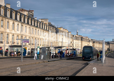 Tram at a tram stop in Bordeaux, France, Europe Stock Photo