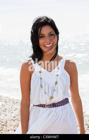 Young woman on beach Stock Photo