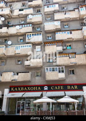 old apartment block with Segafredo cafe, Rudaki Street, Dushanbe, Tajikistan Stock Photo