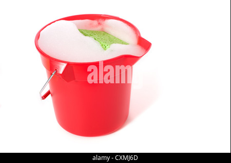 A bucket of soapy water on a white background with copy space Stock Photo