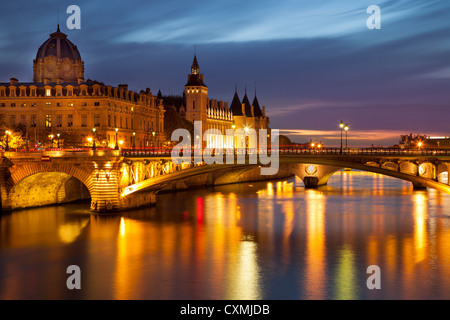 Twilight over River Seine below the Conciergerie, Paris France Stock Photo