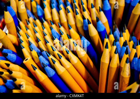 New, sharp blue and brown leaded pencils seen from above. Stock Photo