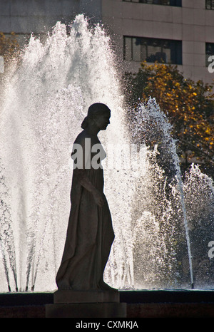 Barcelona's central Placa de Catalunya silhouetted statue and fountain Stock Photo