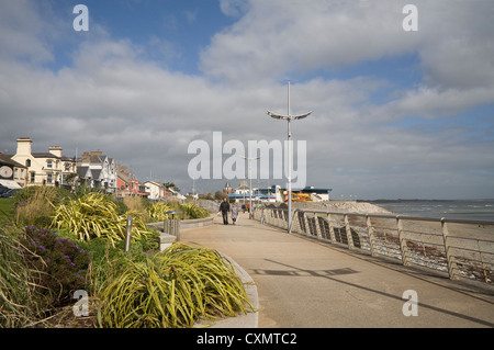 Newcastle Co Down Northern Ireland September Visitors stroll along the promenade of this pretty seaside resort Stock Photo