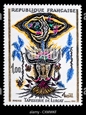 Unused 1966 French postage stamp depicting 'Tapisserie de Lurcat' weaving. Stock Photo