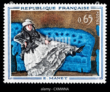 Unused 1962 French postage stamp depicting 'Mme. Manet au Canapé Bleu' by Edouard Manet. Stock Photo