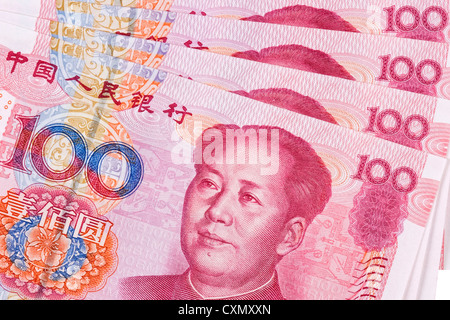 Chinese 100 RMB or Yuan featuring Chairman Mao on the front of each bill Stock Photo