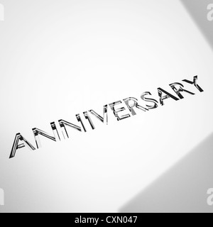 engraving of anniversary words on silver or platinum surface, for celebrations. Stock Photo