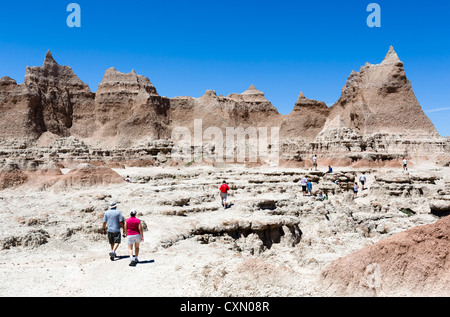 Tourists on the Door Trail, Badlands National Park, South Dakota, USA Stock Photo