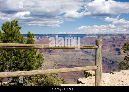 rustic wooden fence with a mountain range in the background Stock Photo