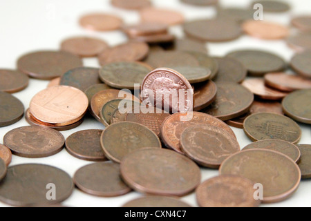 1 Penny shiny coin among other UK Copper coins 1 Penny shiny coin among other UK Copper coins