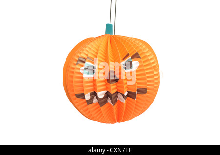 Paper pumpkin decoration for Halloween shot in studio and isolated on a white background Stock Photo