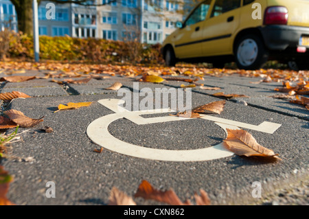 disabled parking permit sign painted on the street Stock Photo