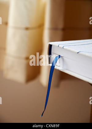 Closed book with blue bookmark Stock Photo