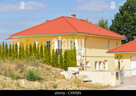 Mediterranean style architecture residence single-family house with tiled roof red orange pantiles Stock Photo
