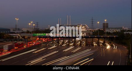 Toll booths at the Dartford River Crossing, on the M25, showing Queen Elizabeth 2nd Bridge. Stock Photo