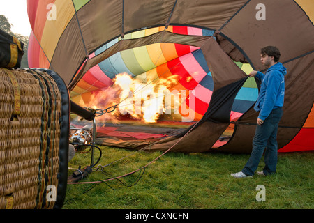 Inflating a hot air balloon. Bristol International Balloon Fiesta Stock Photo