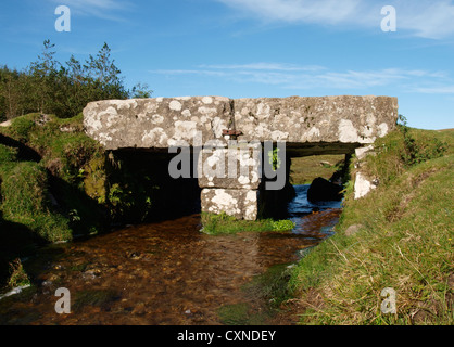 Old stone clapper bridge over a stream, Bodmin Moor, Cornwall, UK Stock Photo