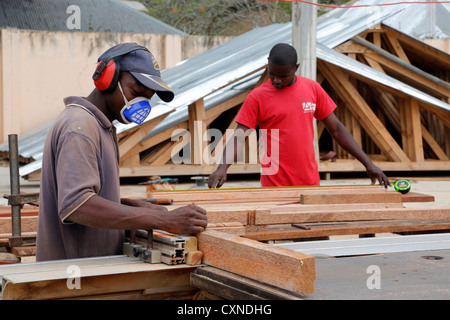 students at a carpenter's workshop, Machui Vocational Center in Machui, Zanzibar, Tanzania Stock Photo