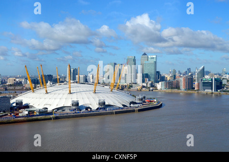 River Thames & millennium dome 2000 O2 arena Greenwich Peninsula Canary Wharf skyline in London Docklands Isle of Dogs Tower Hamlets England UK Stock Photo