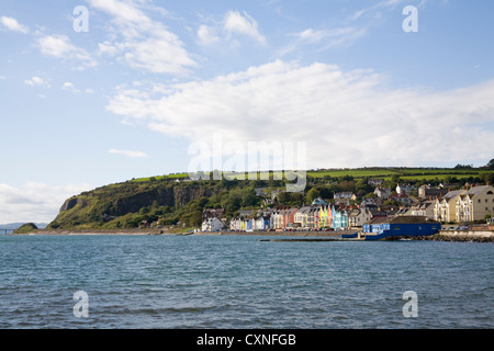 Whitehead Co Antrim Northern Ireland September View across Belfast Lough to colourful sea front properties of this small village Stock Photo