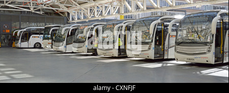 National Express coaches waiting for passengers to board at Victoria Coach Station London England UK Stock Photo