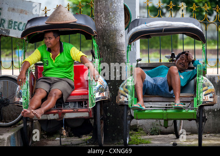 Rickshaw Drivers in Yogyakarta in Indonesia Stock Photo