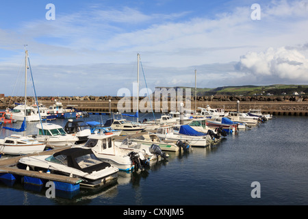 Boats moored in the harbour marina on northeast coast in Ballycastle, County Antrim, Northern Ireland, UK. Stock Photo