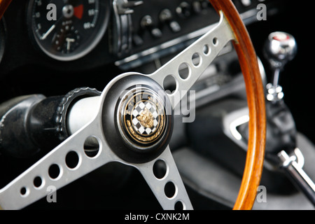 Jaguar E-Type interior shot of steering wheel and dashboard Stock Photo